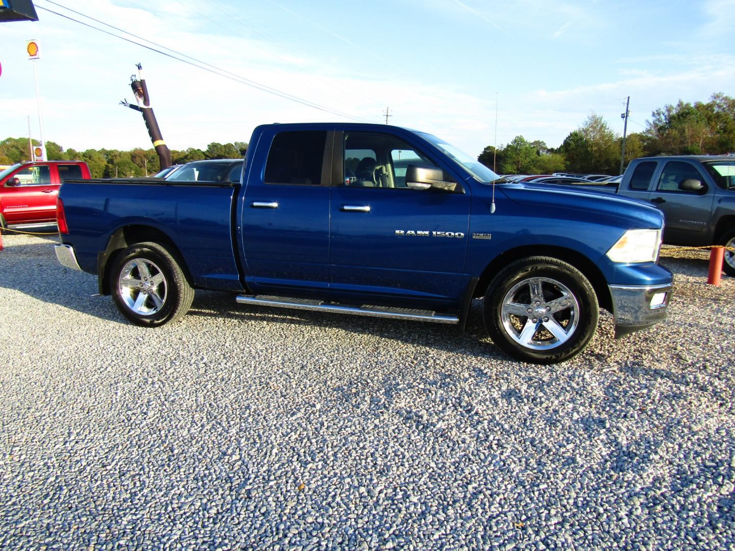 2011 Blue Dodge Ram 1500 SLT Quad Cab 2WD (1D7RB1GT3BS) with an 5.7L V8 OHV 16V engine, Automatic transmission, located at 15016 S Hwy 231, Midland City, AL, 36350, (334) 983-3001, 31.306210, -85.495277 - Photo#0